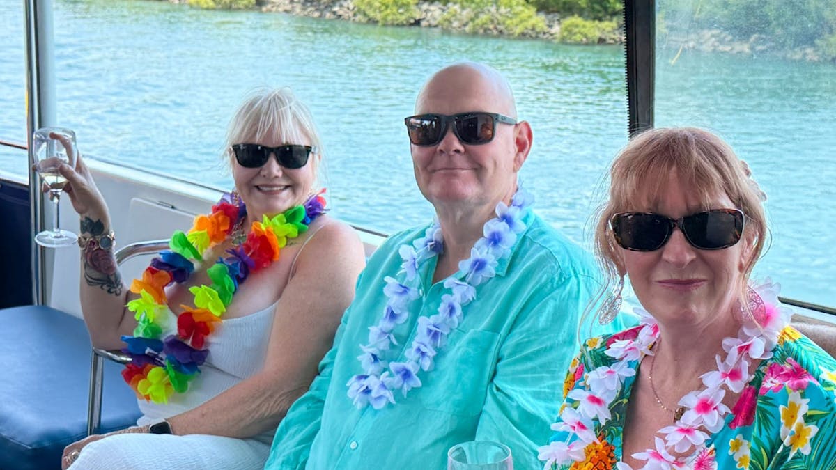 guests on the flybridge deck enjoying the music