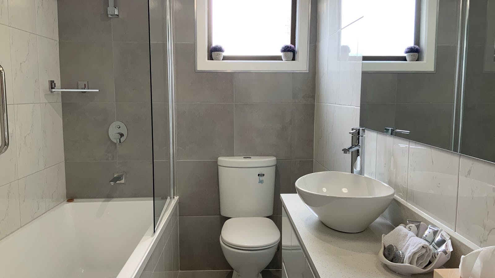 Ensuite bathroom with bath
