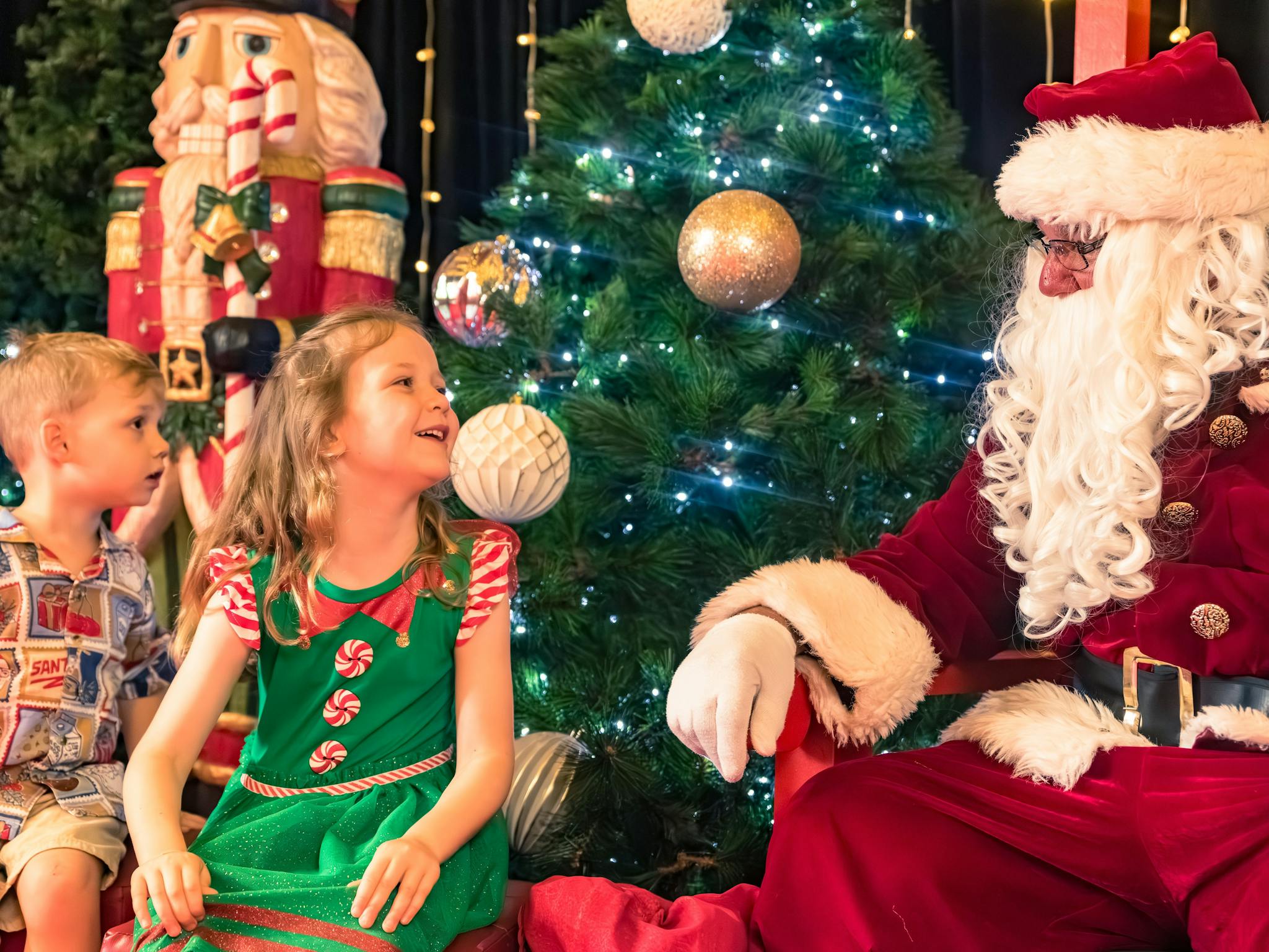 Children sitting with Santa