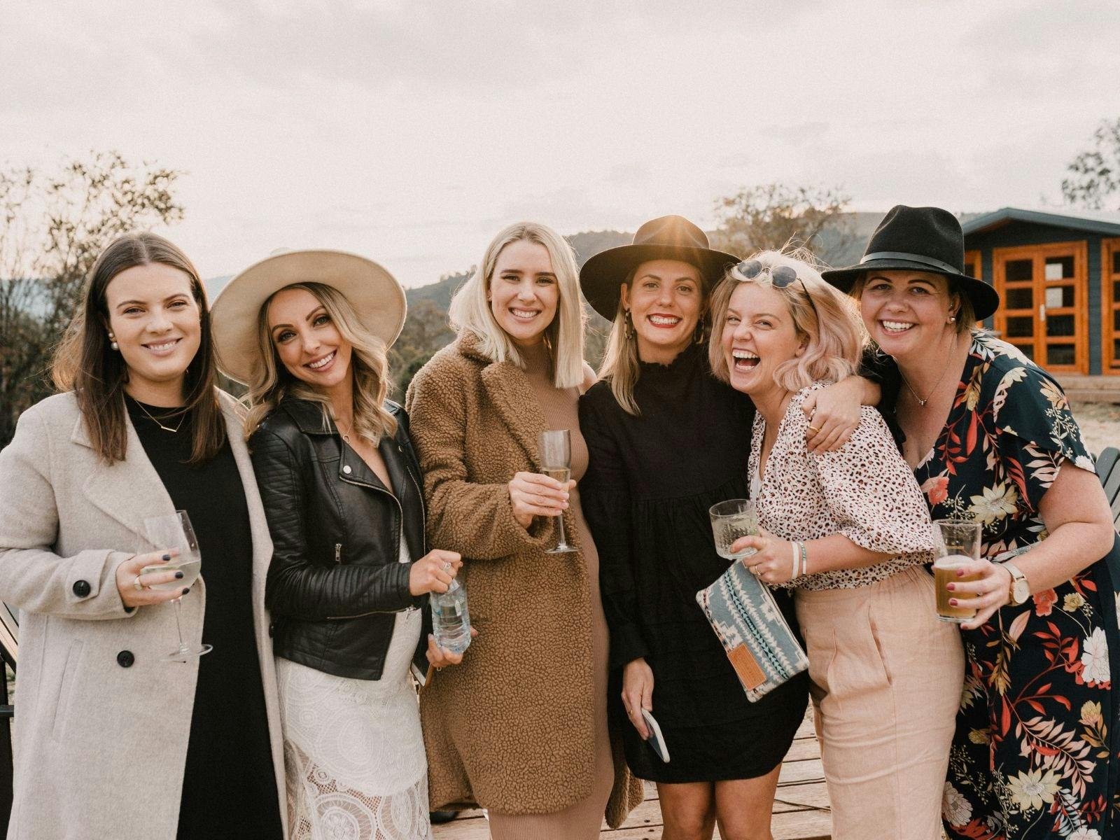 A tour group posing for a photographer at Dalgety Brewing Co