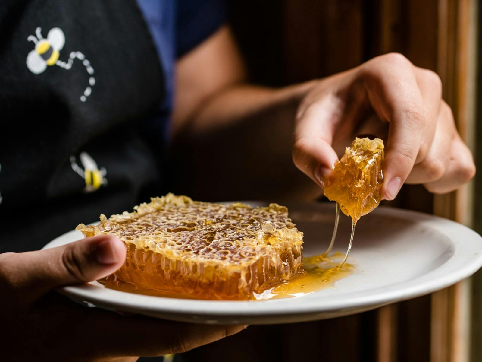 Honey on a platter including honeycomb