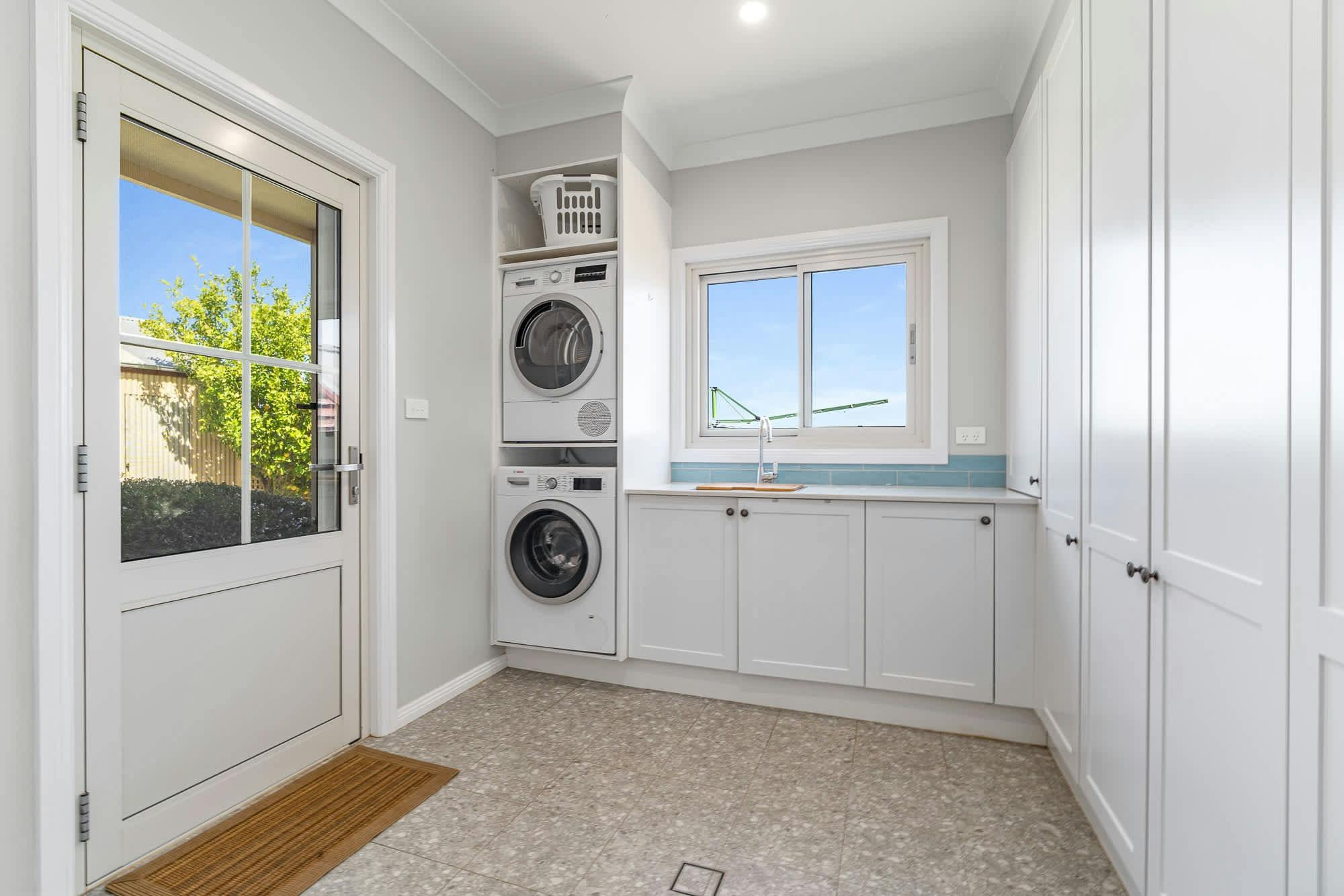 Laundry with washing machine, dryer and lots of storage