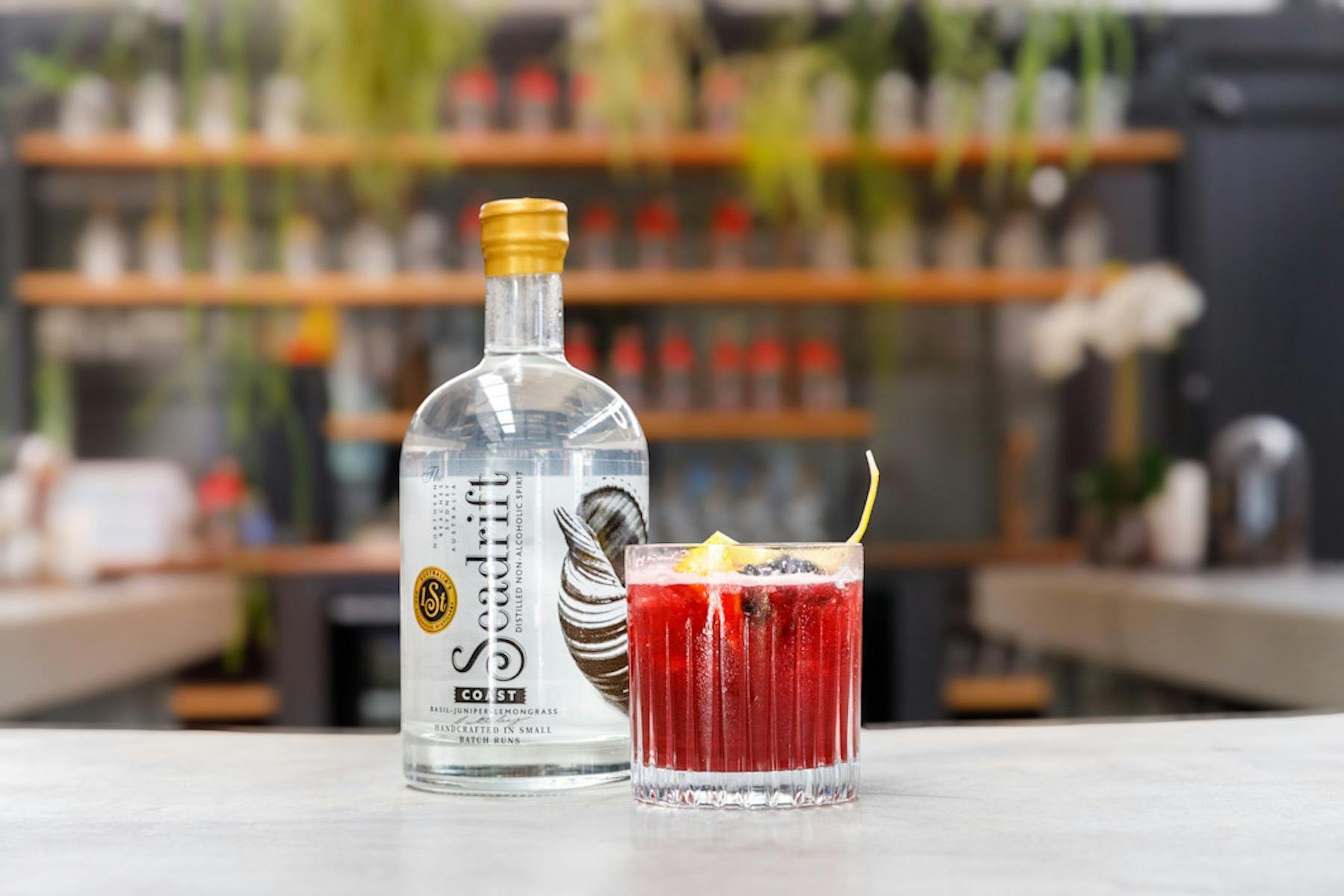 A picture of a Seadrift Coast bottle and Blackberry Bramble Cockail