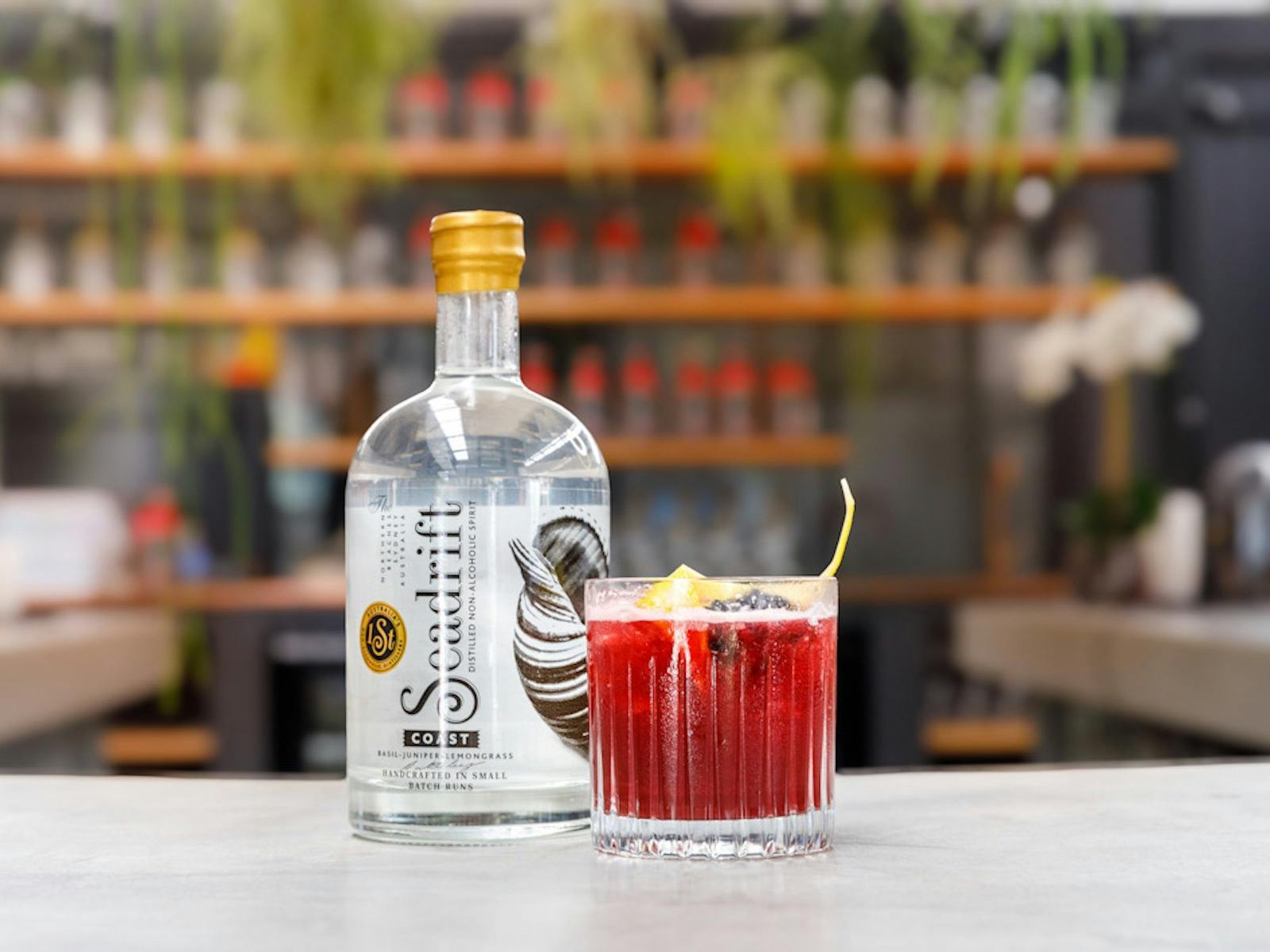 A picture of a Seadrift Coast bottle and Blackberry Bramble Cockail