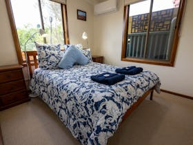 Features a queen bed