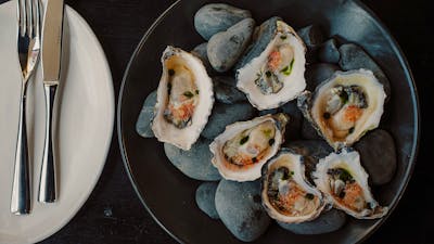 Appellation oysters, lemon myrtle vinegar, finger lime