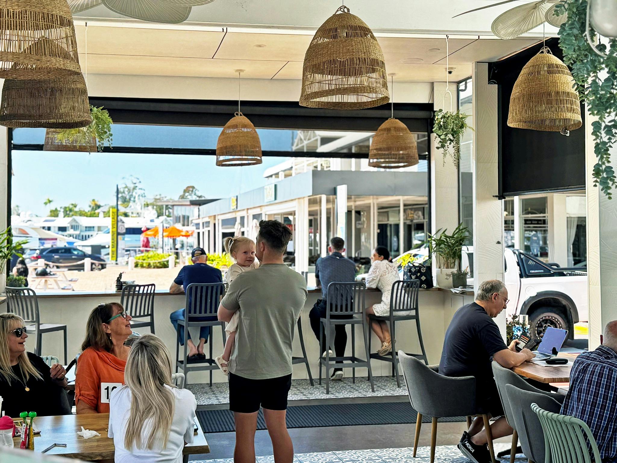 Happy customers enjoying excellent coffee, food and the best service at Native Harvest Cafe