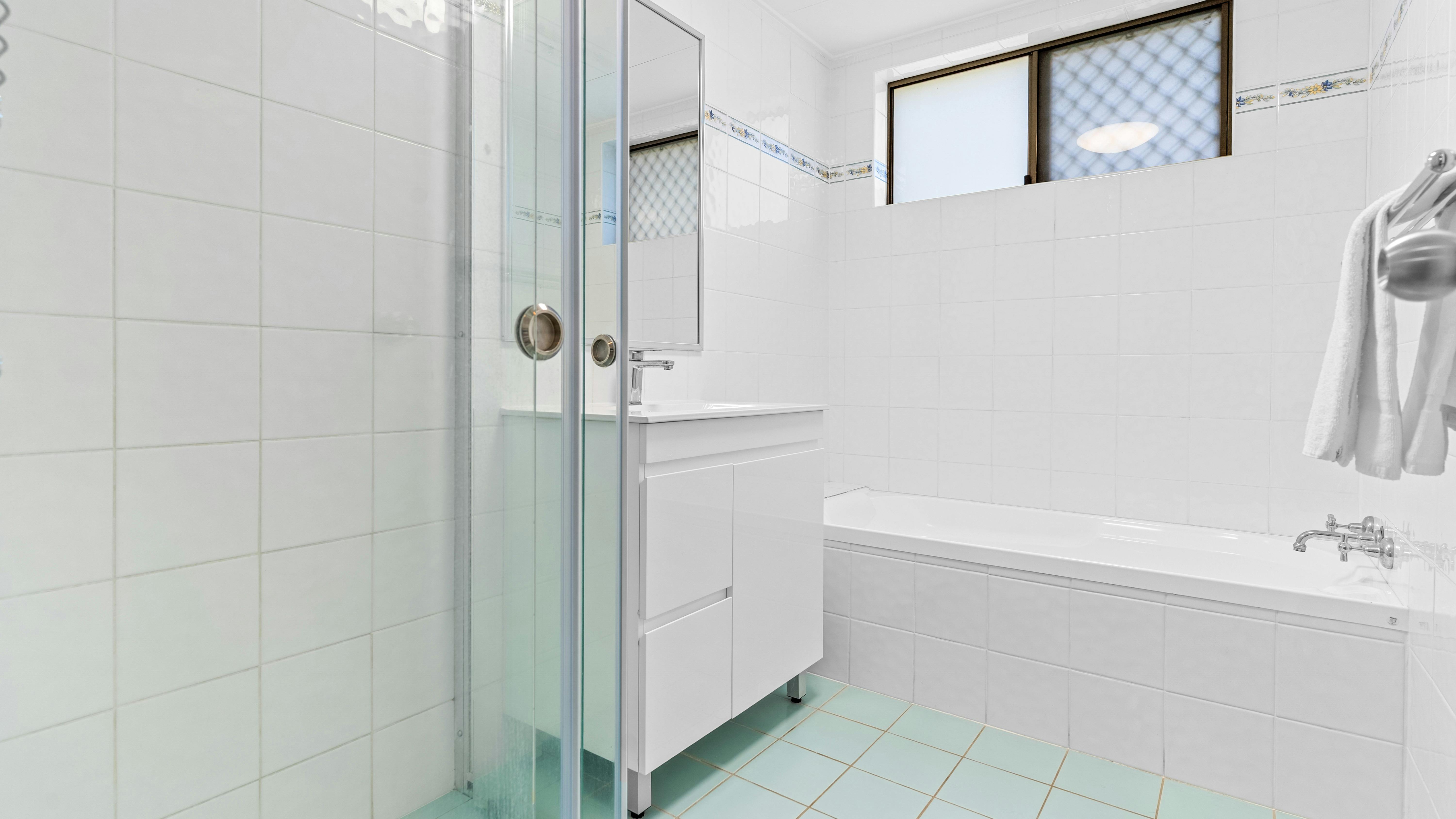Bathroom with separate bath and shower
