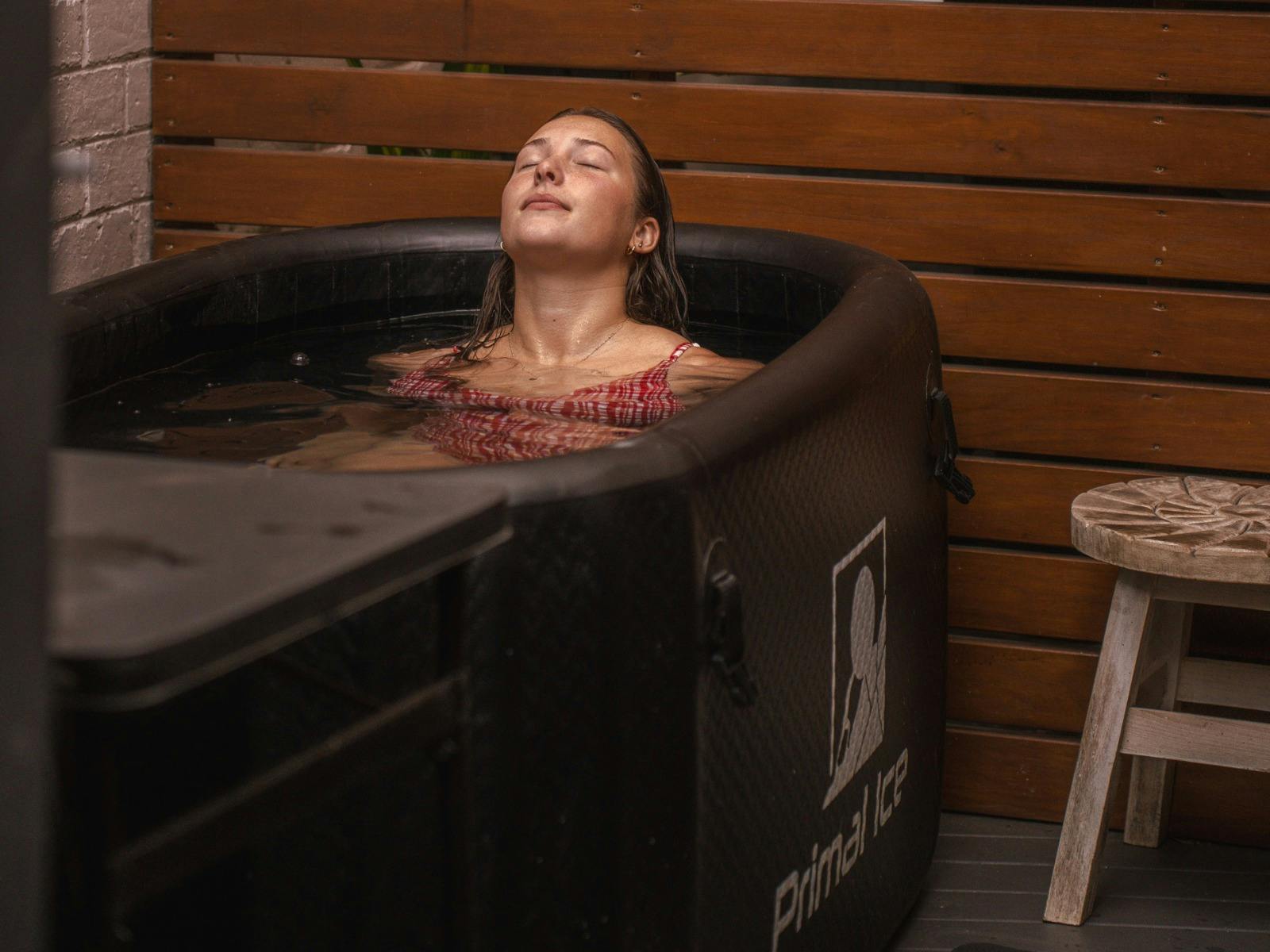 A woman enjoying an ice bath