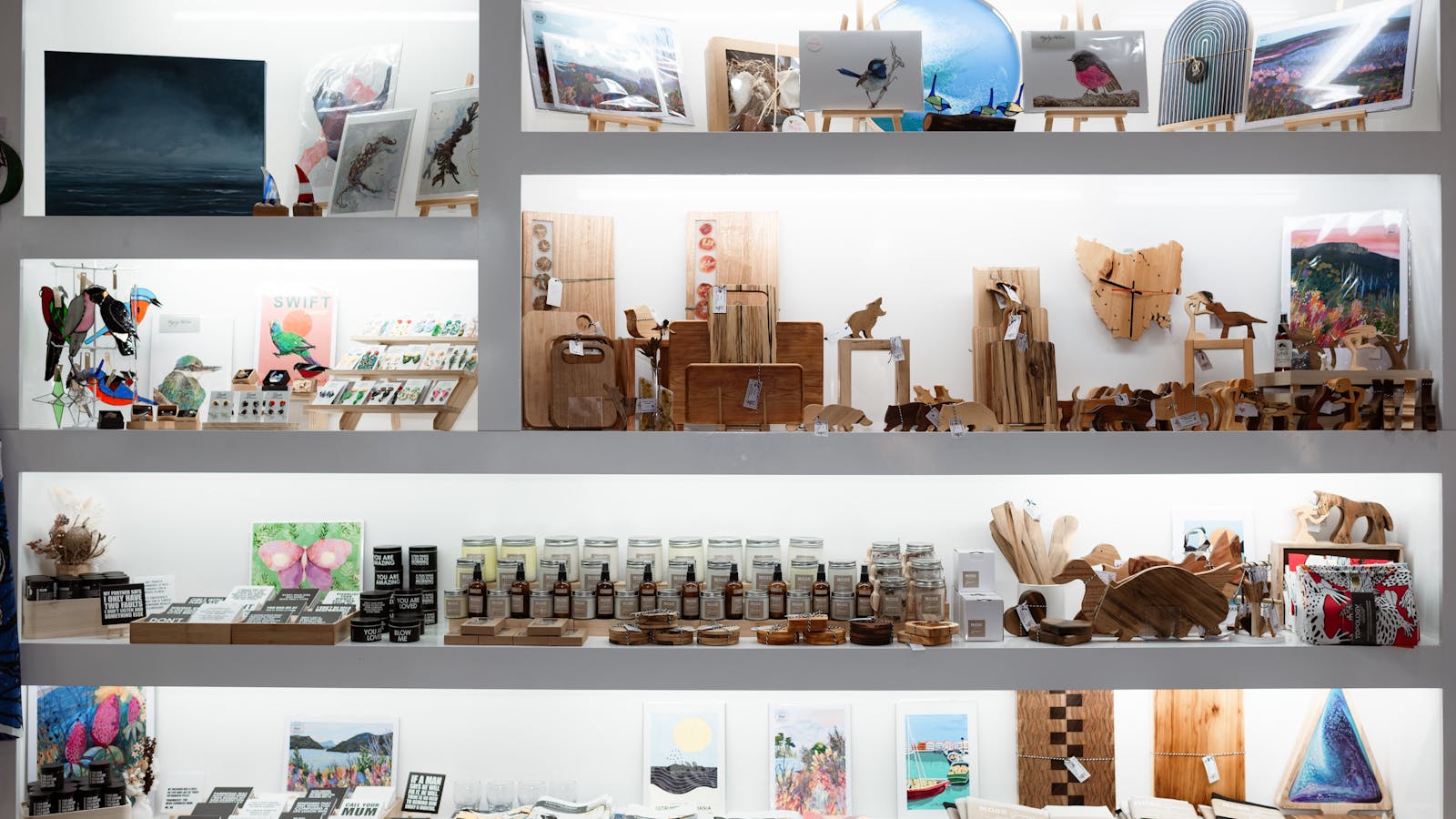 Shelves stocked with Tasmanian Made giftware and art at Tassie Makers Market