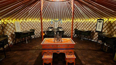 Inside of the Yurt(Ger) fully set for dine in