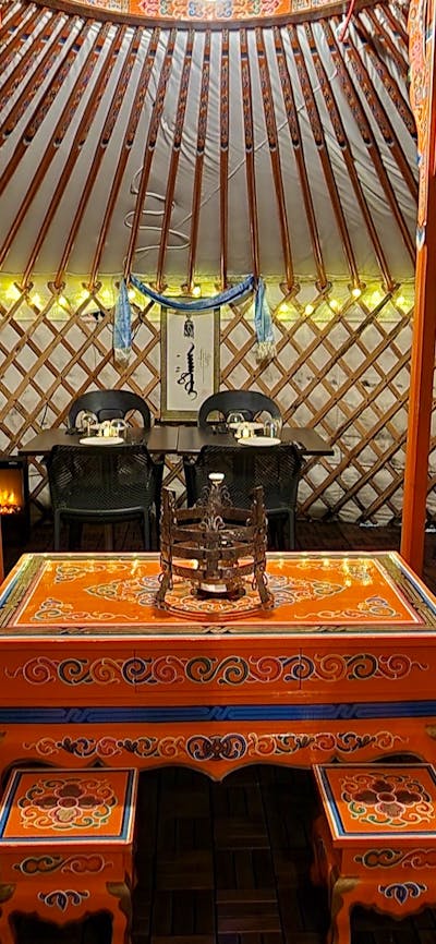 Inside of the Yurt(Ger) fully set for dine in