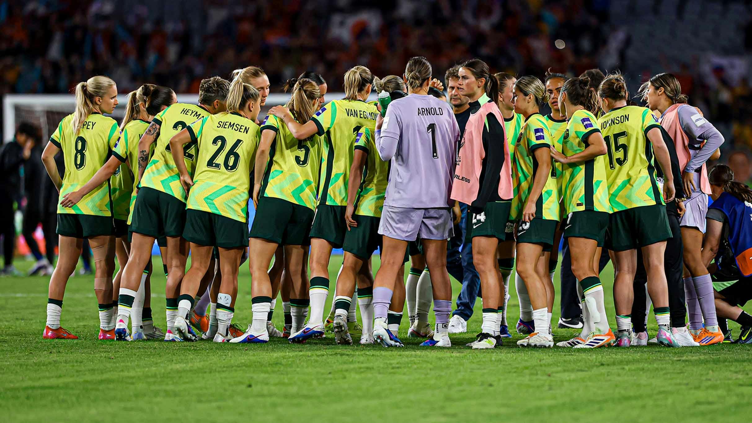 CommBank Matildas in a team huddle