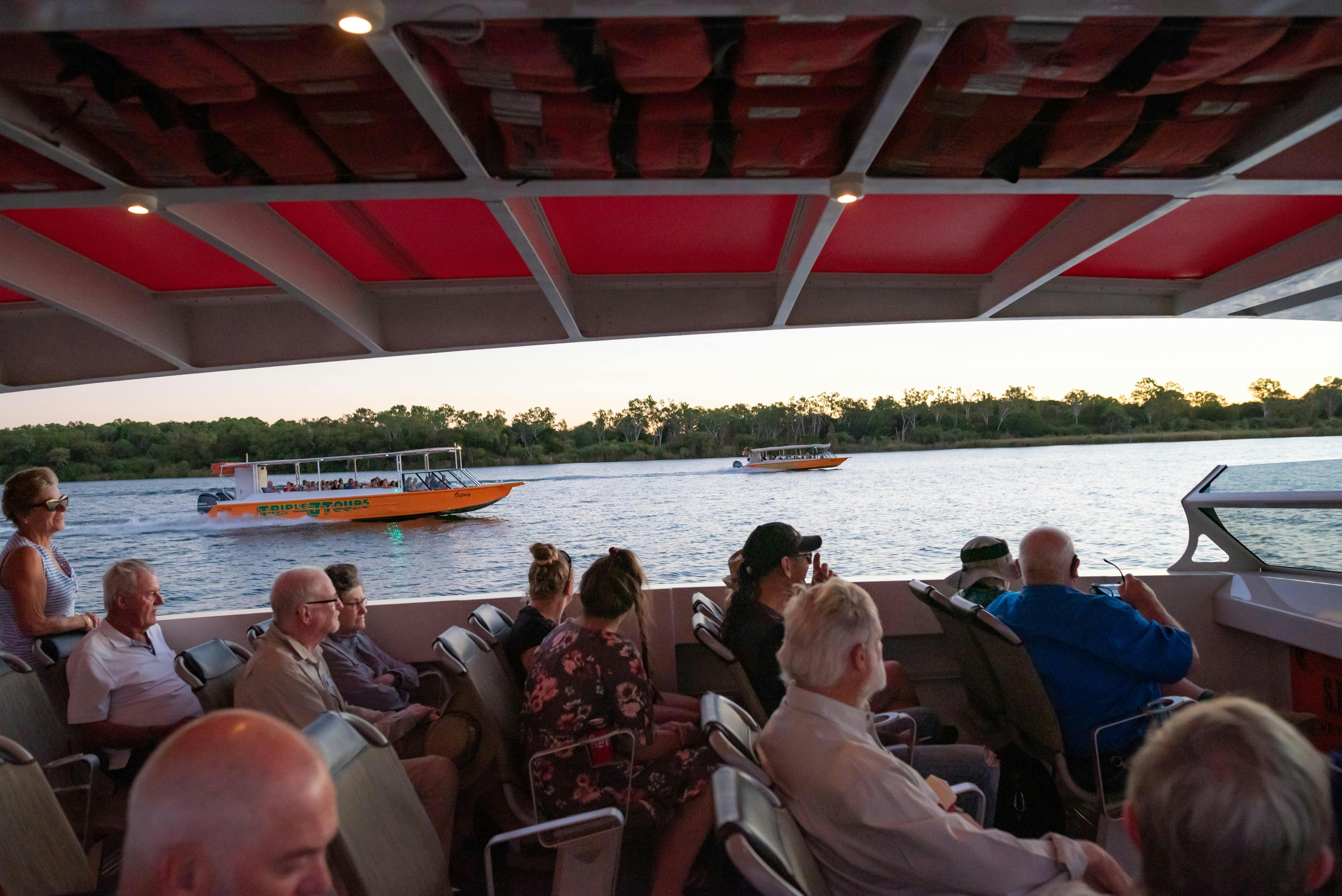 Vessels cruising together at sunset