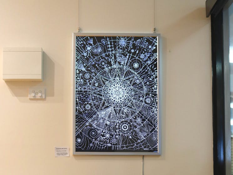 Image shows a lightbox artwork on display at the Gallery