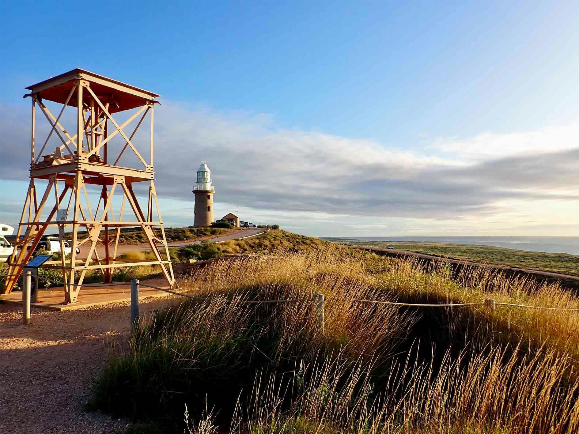 A view of the Vlamingh Head Lighthouse, with the old WWII Radar Station in the foreground