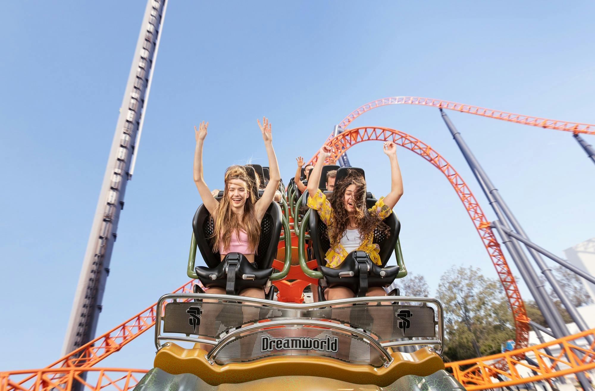 Two teens riding the Steel Taipan rollercoaster at Dreamworld