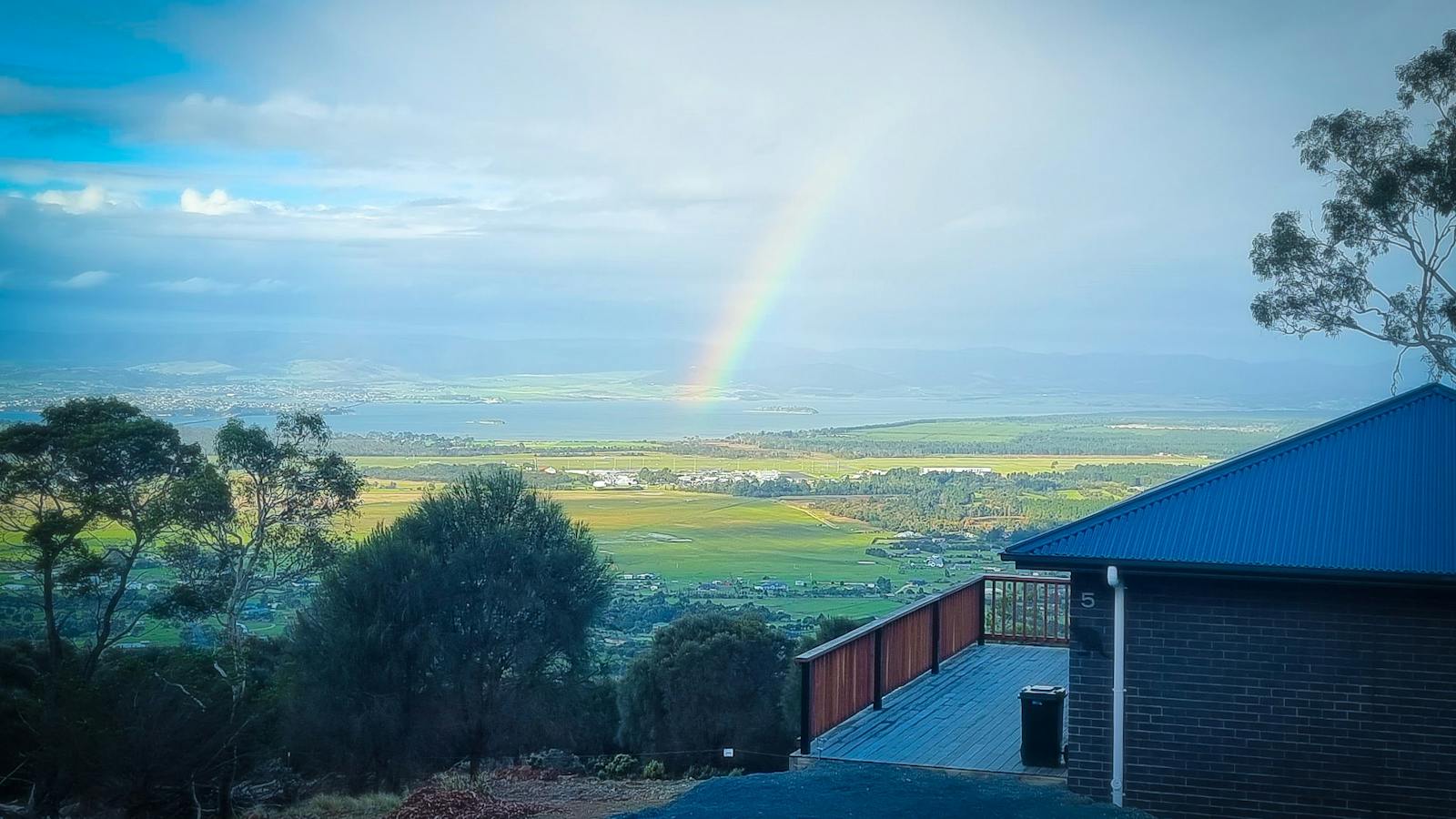 Rainbow over the Tasmanian landscape