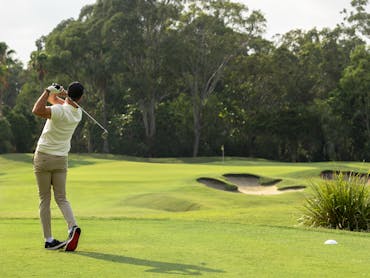 Golfer on The Palms Golf Course Golfer on The Palms Golf Course