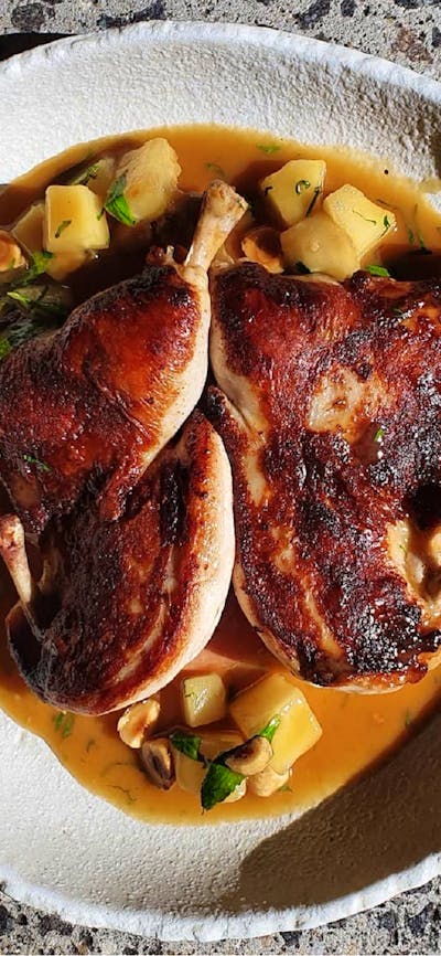 Colourful dish featuring chicken and potatoes