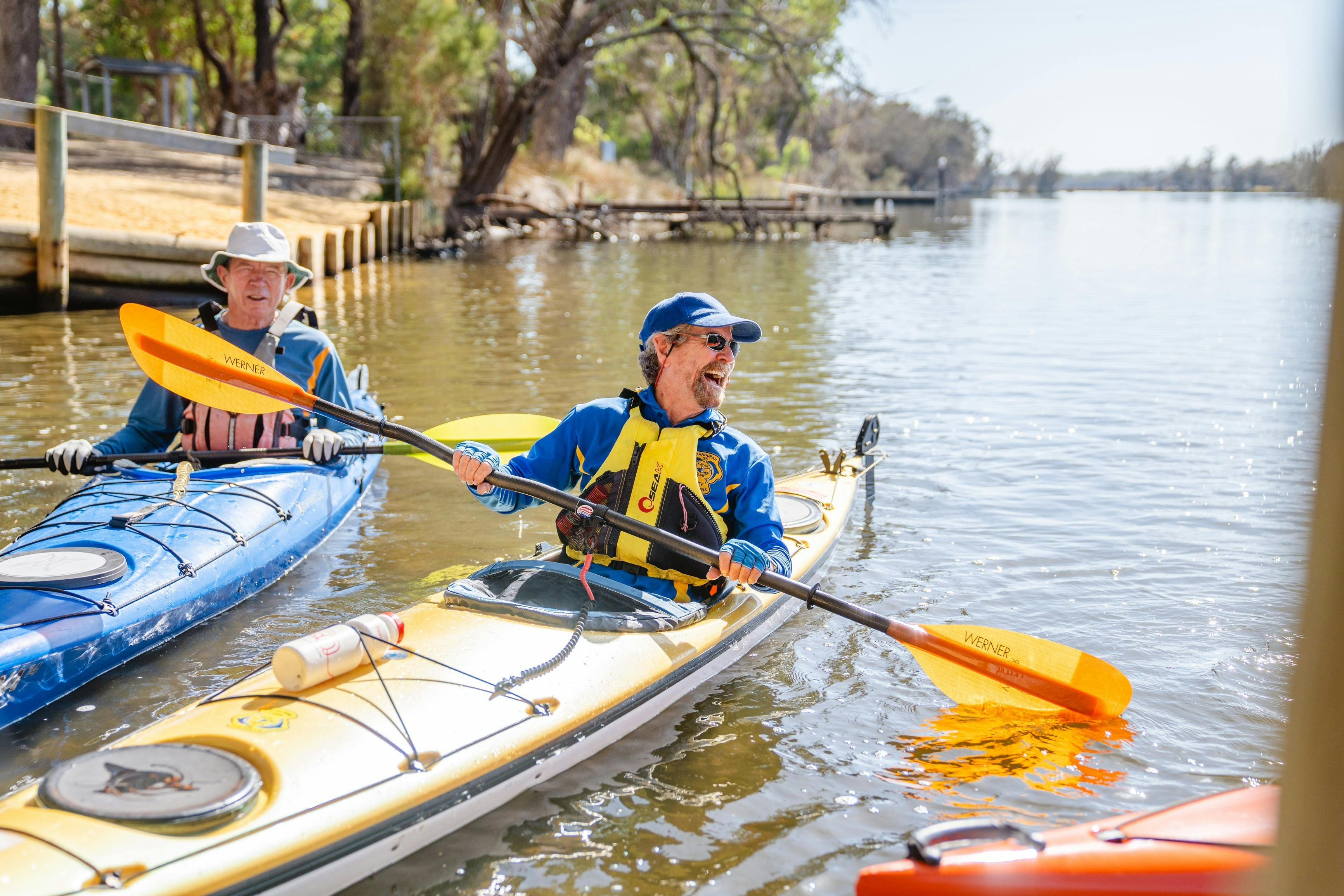 Two kayakers close to Riverside Gardens launch.