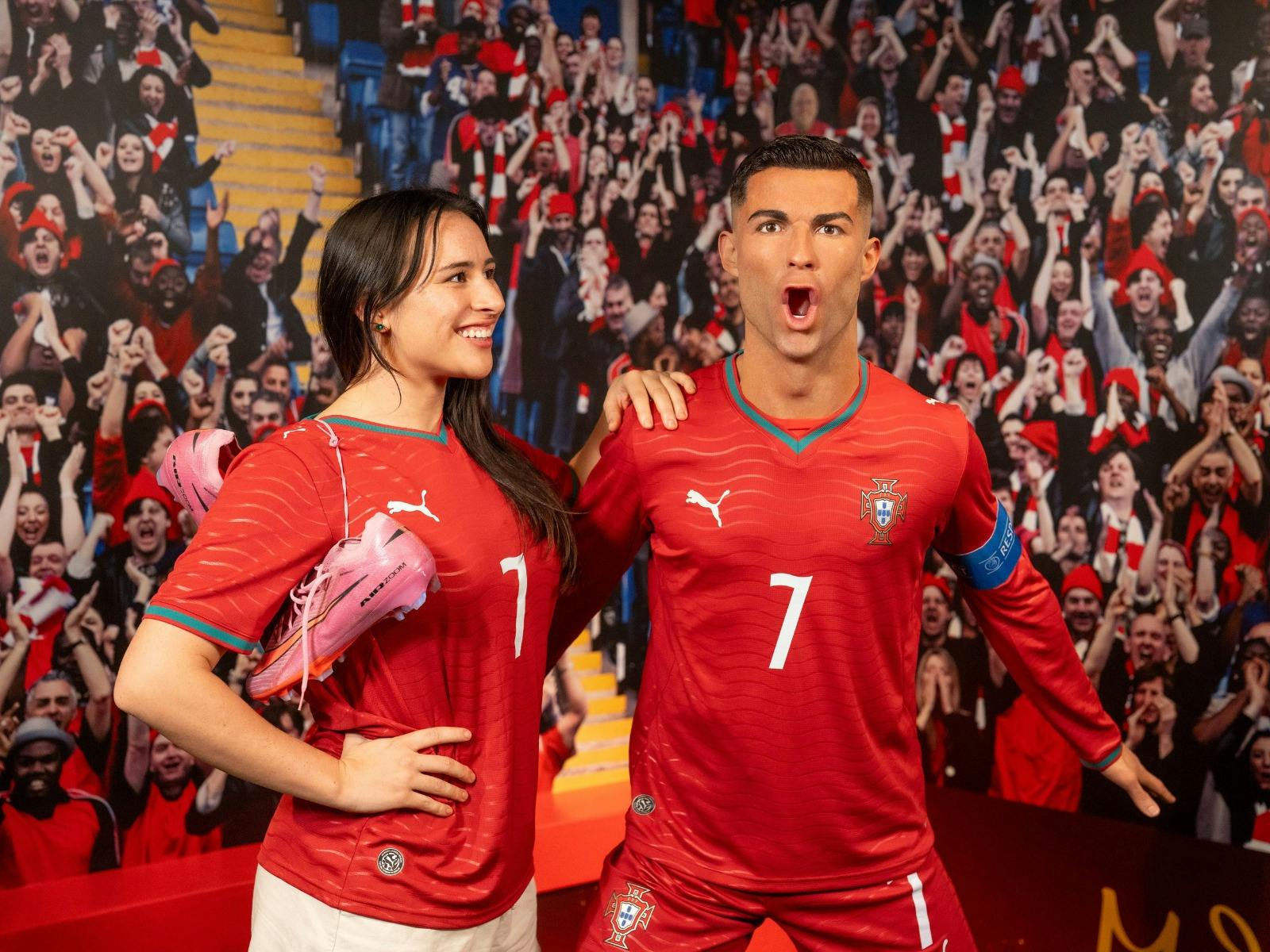 Fan posing with the iconic athlete, Christiano Ronaldo, at Madame Tussauds Sydney