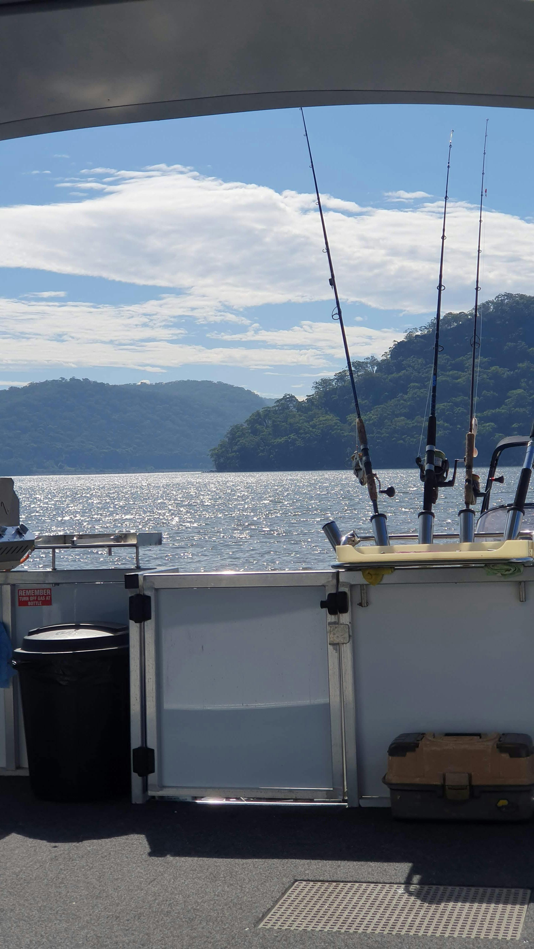 The boats are set for fishing adventures , rod holders, sink and BBQ