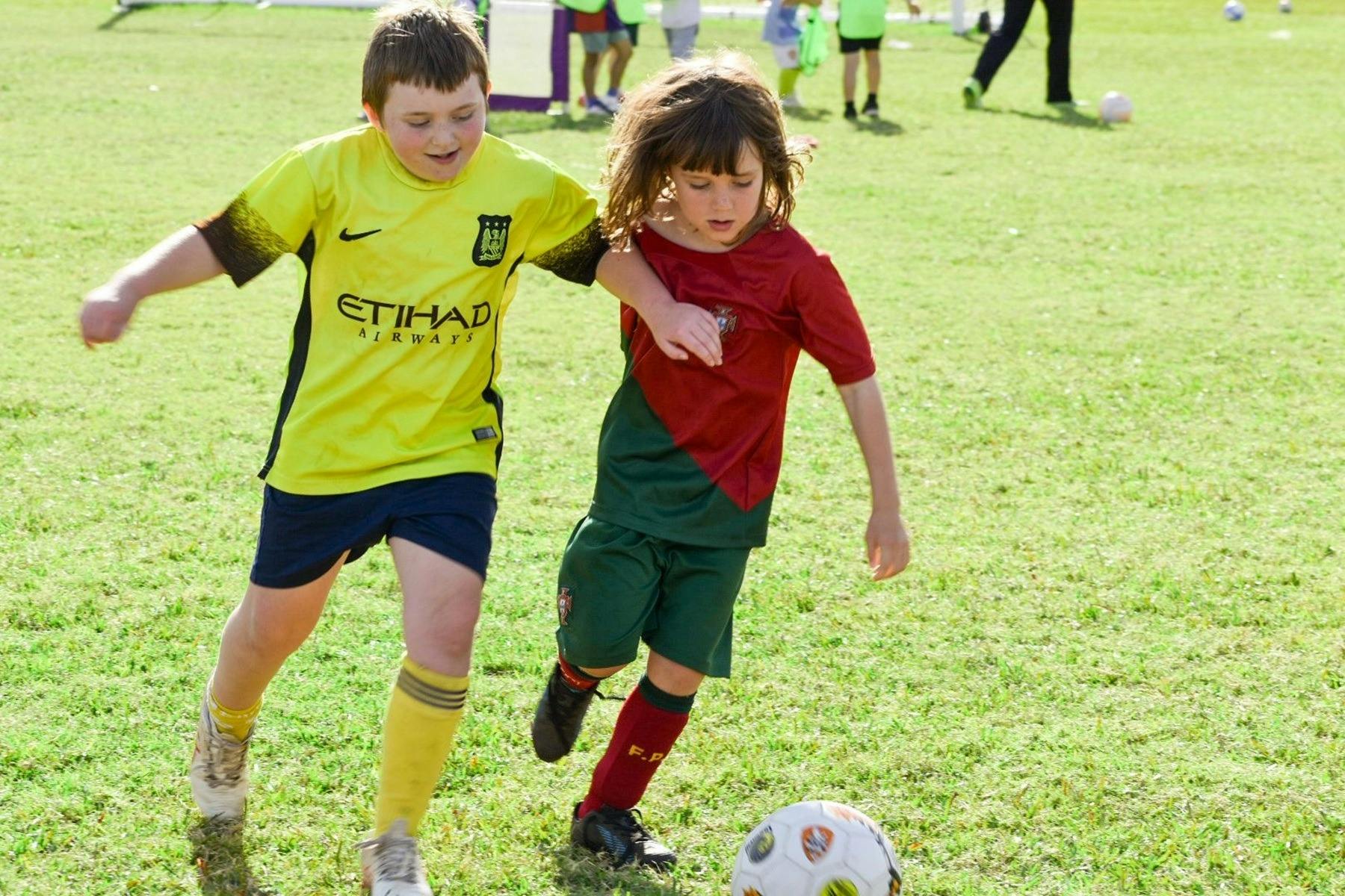 Children playing soccer