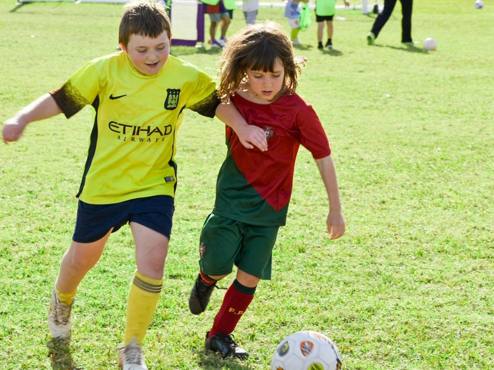 Children playing soccer