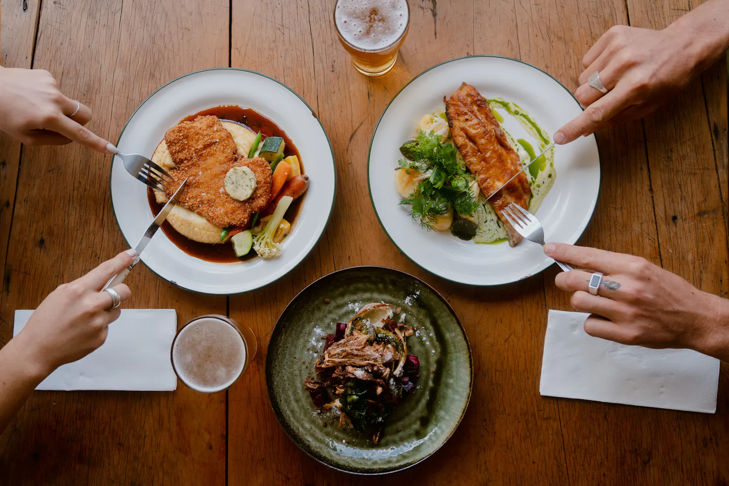 3 plated of food on a table