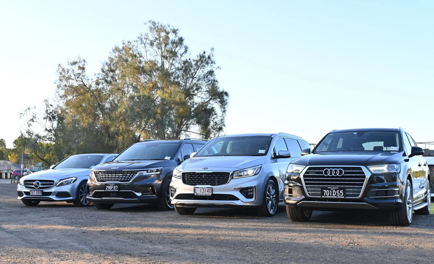 Mercedes Sedan, KIA Carnival, Audi Q7