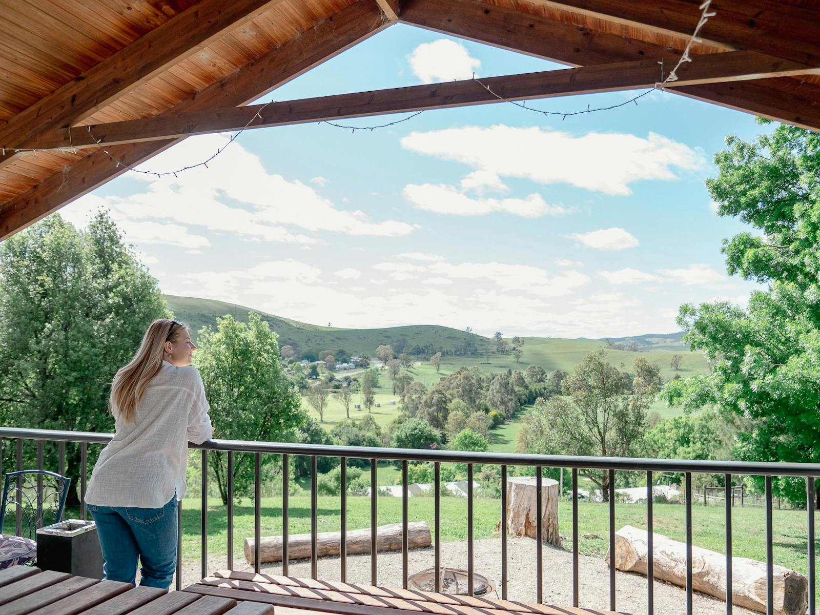 a woman looking over a valley