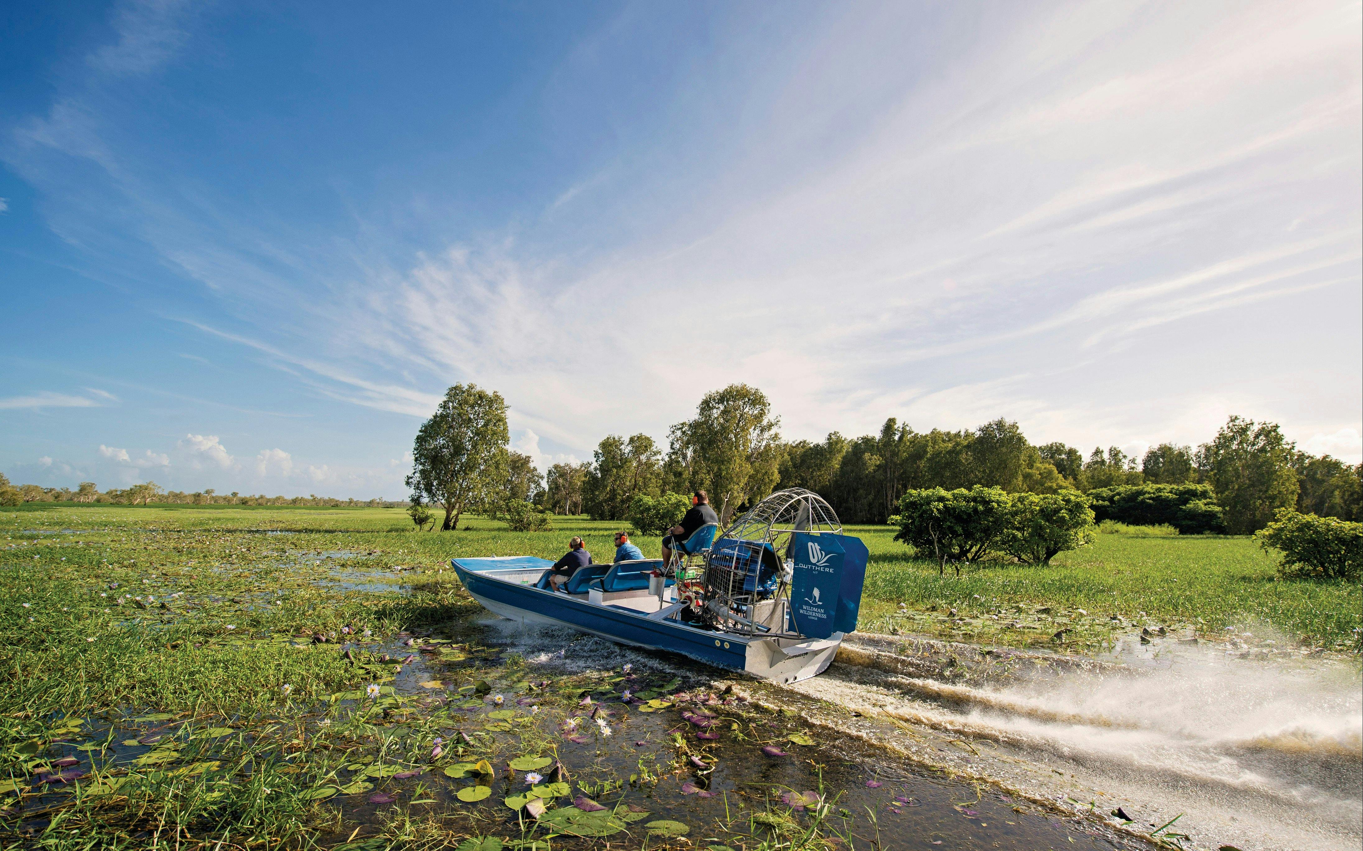 Group of visitors air boating in Mary River