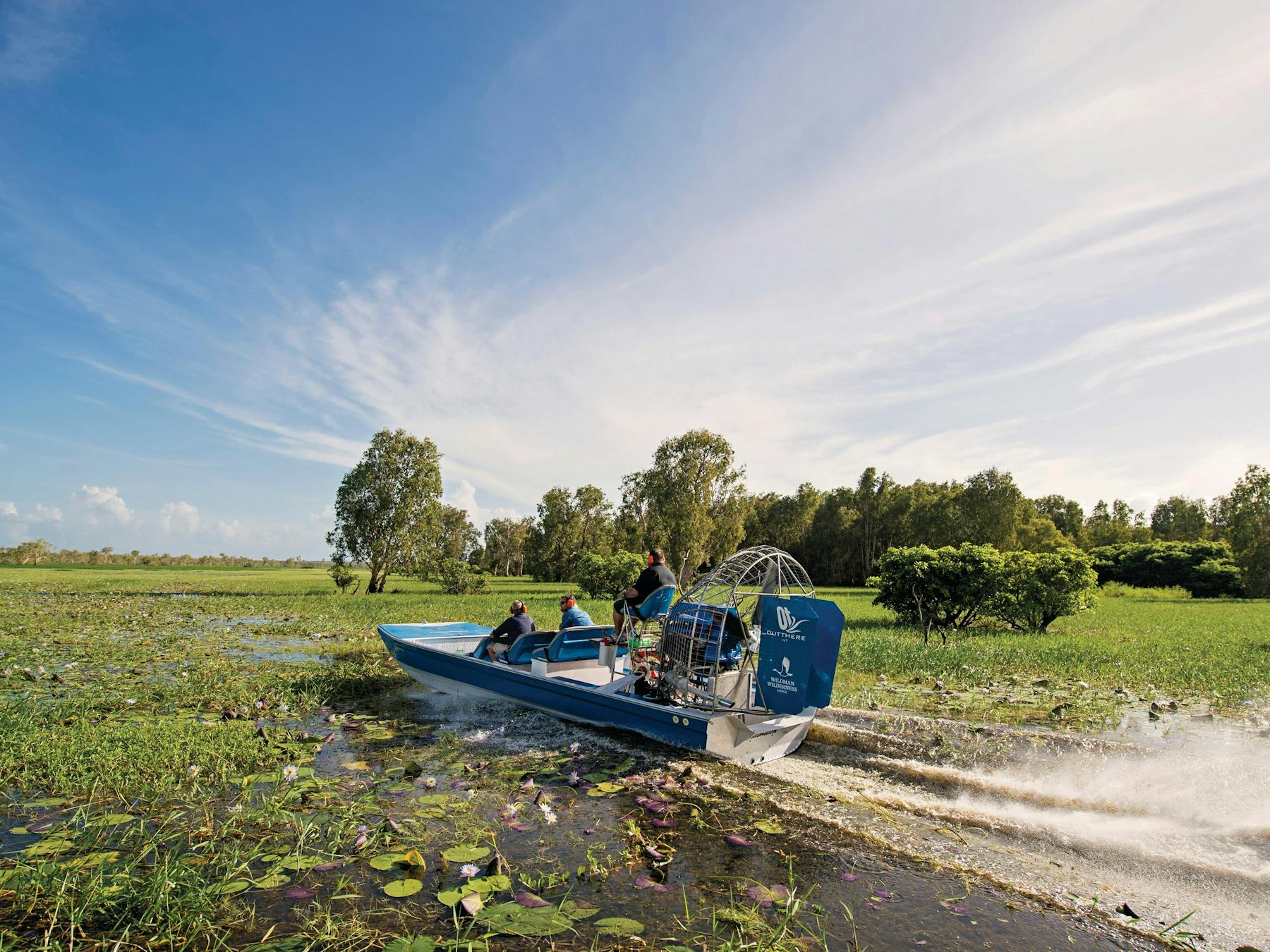 Group of visitors air boating in Mary River
