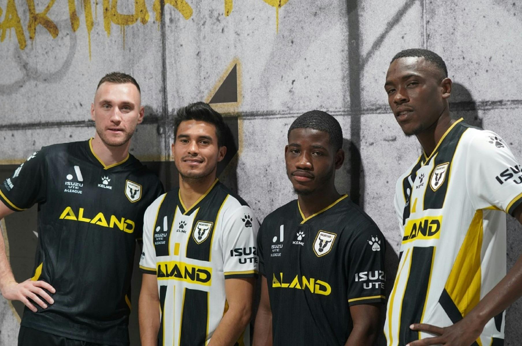 Macarthur Football club players wearing home and away jerseys