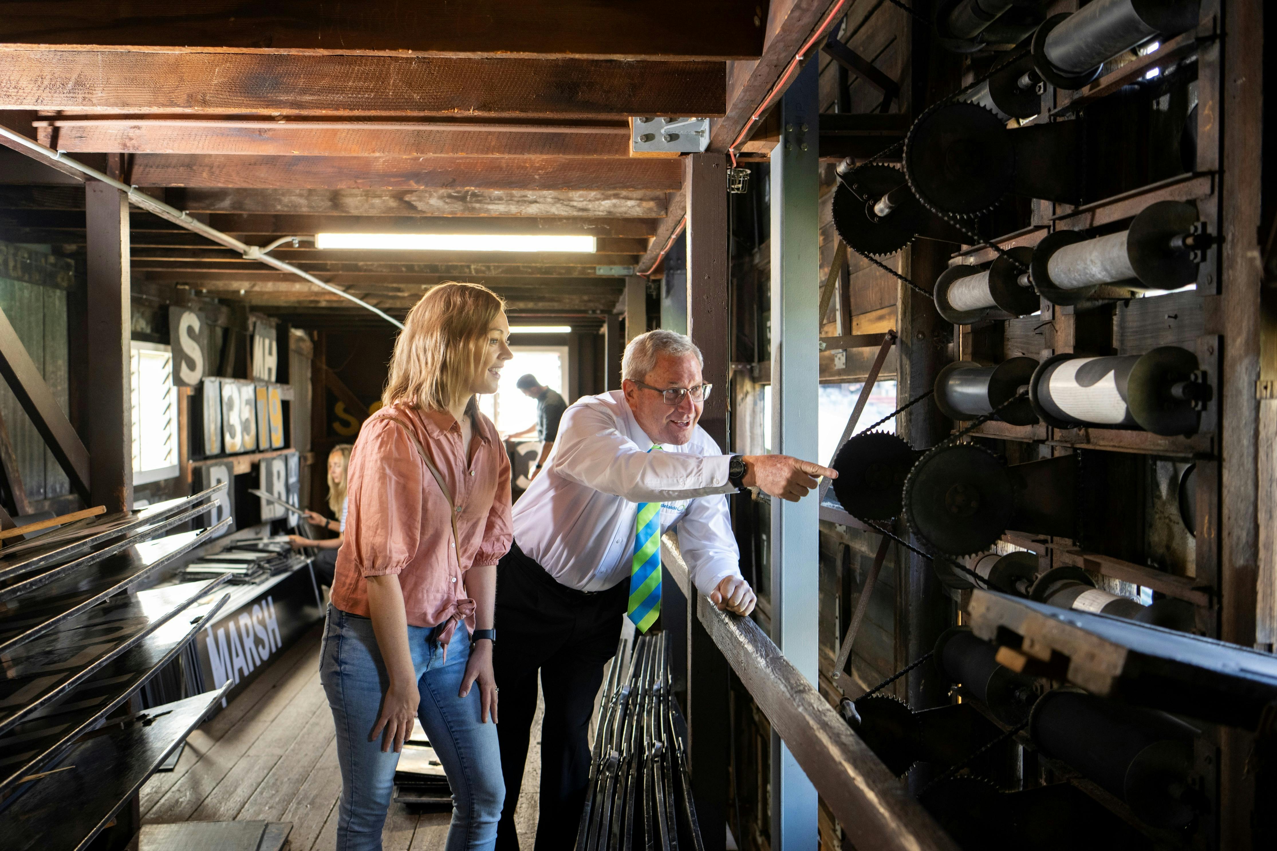 Tour group inside Adelaide Oval heritage scoreboard