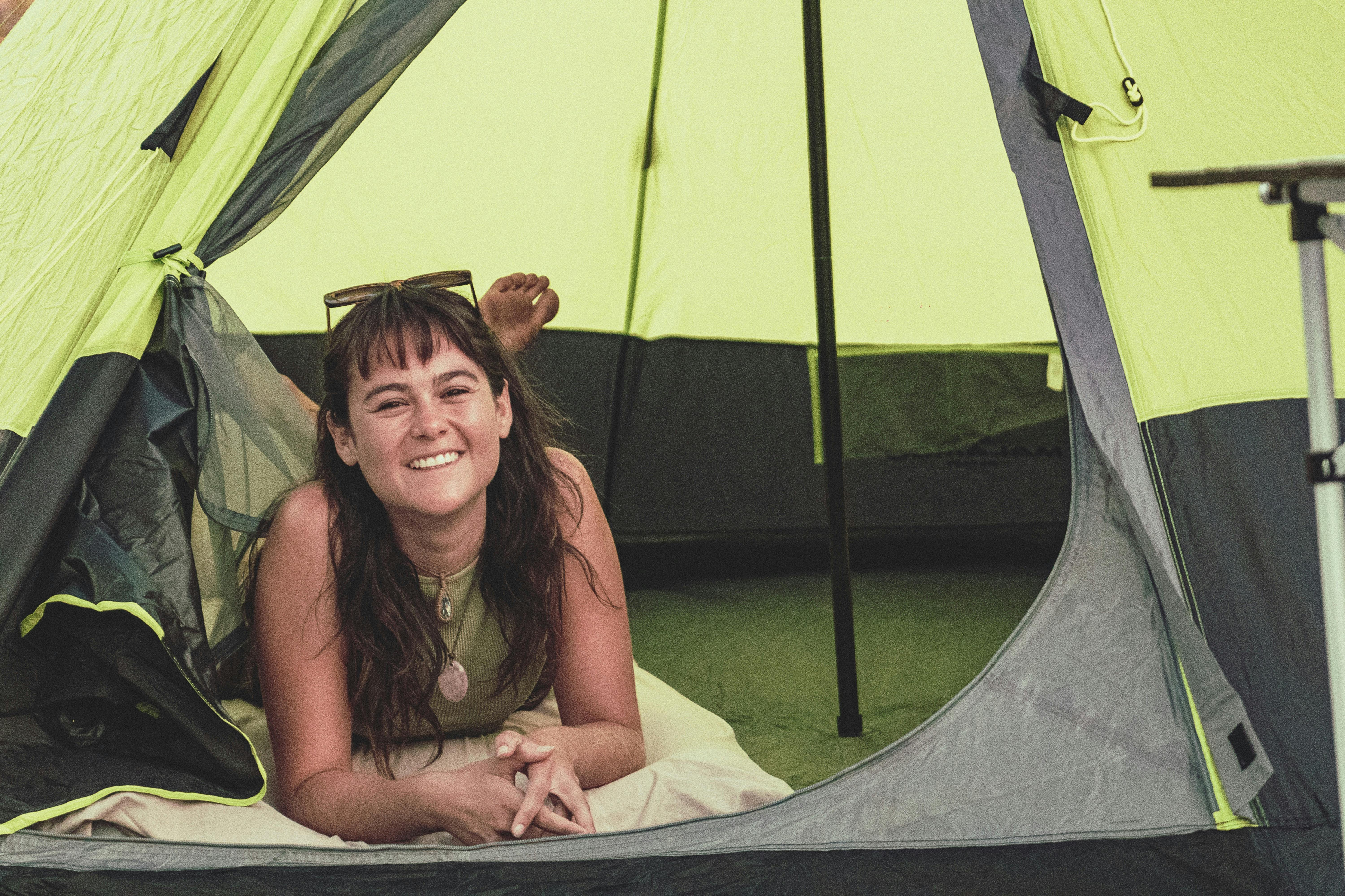 Tipi tent with girl looking out