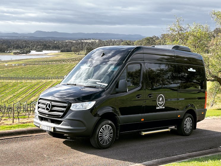 Mercedes Benz wine tour bus