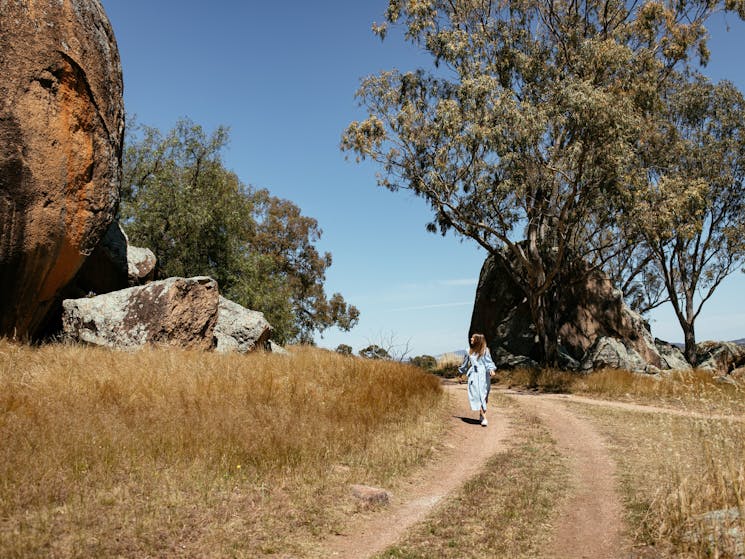 Lady walking towards camera looking at the lookout