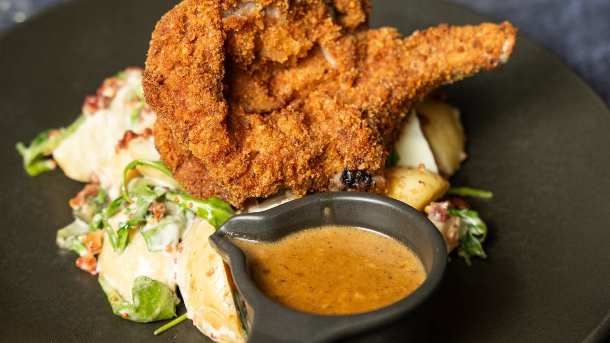 Crumber pork cutlet with German style potato salad Crumber pork cutlet with German style potato salad