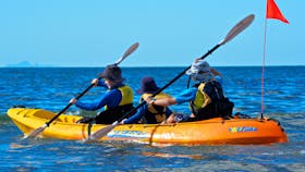 Three children in kayak