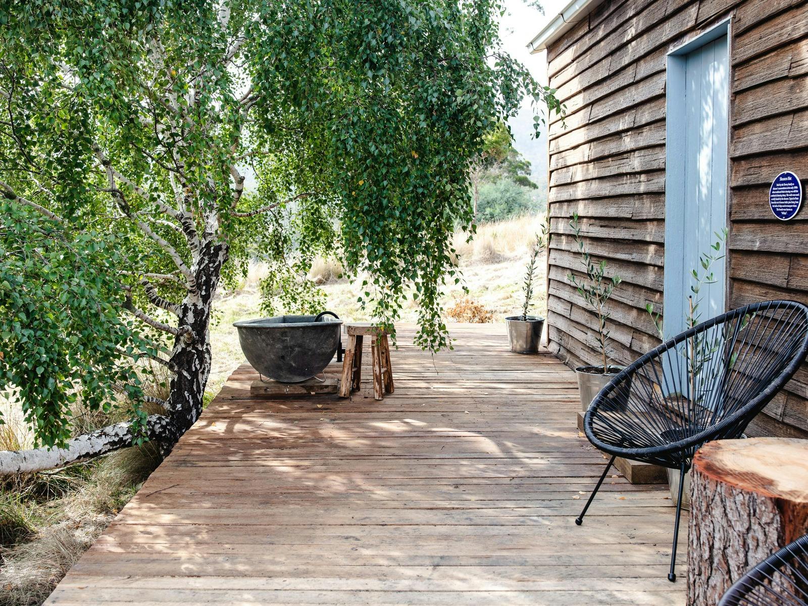 Farmhouse picnic and cosy shearers hut stay image