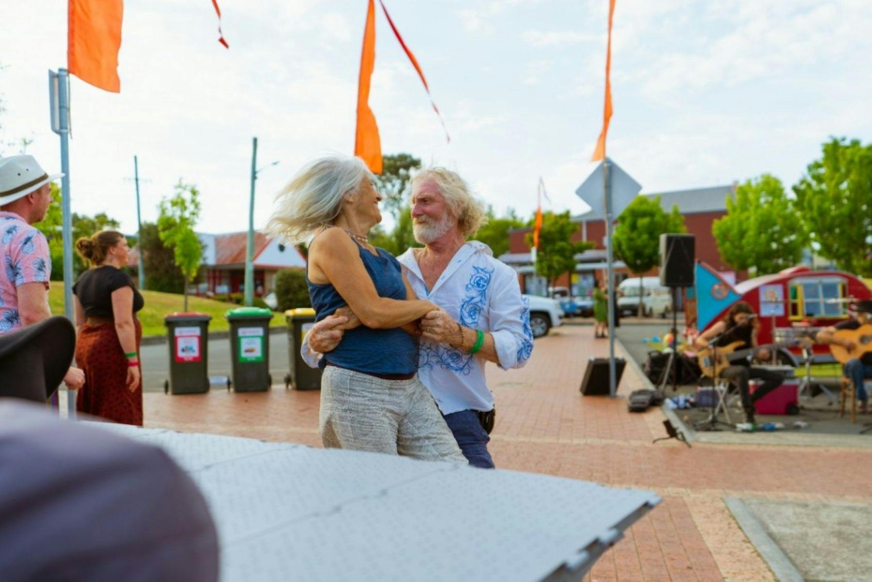 Tents set up along the creek for campers at the festival