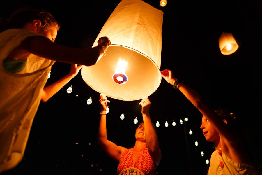 Releasing lanterns at night