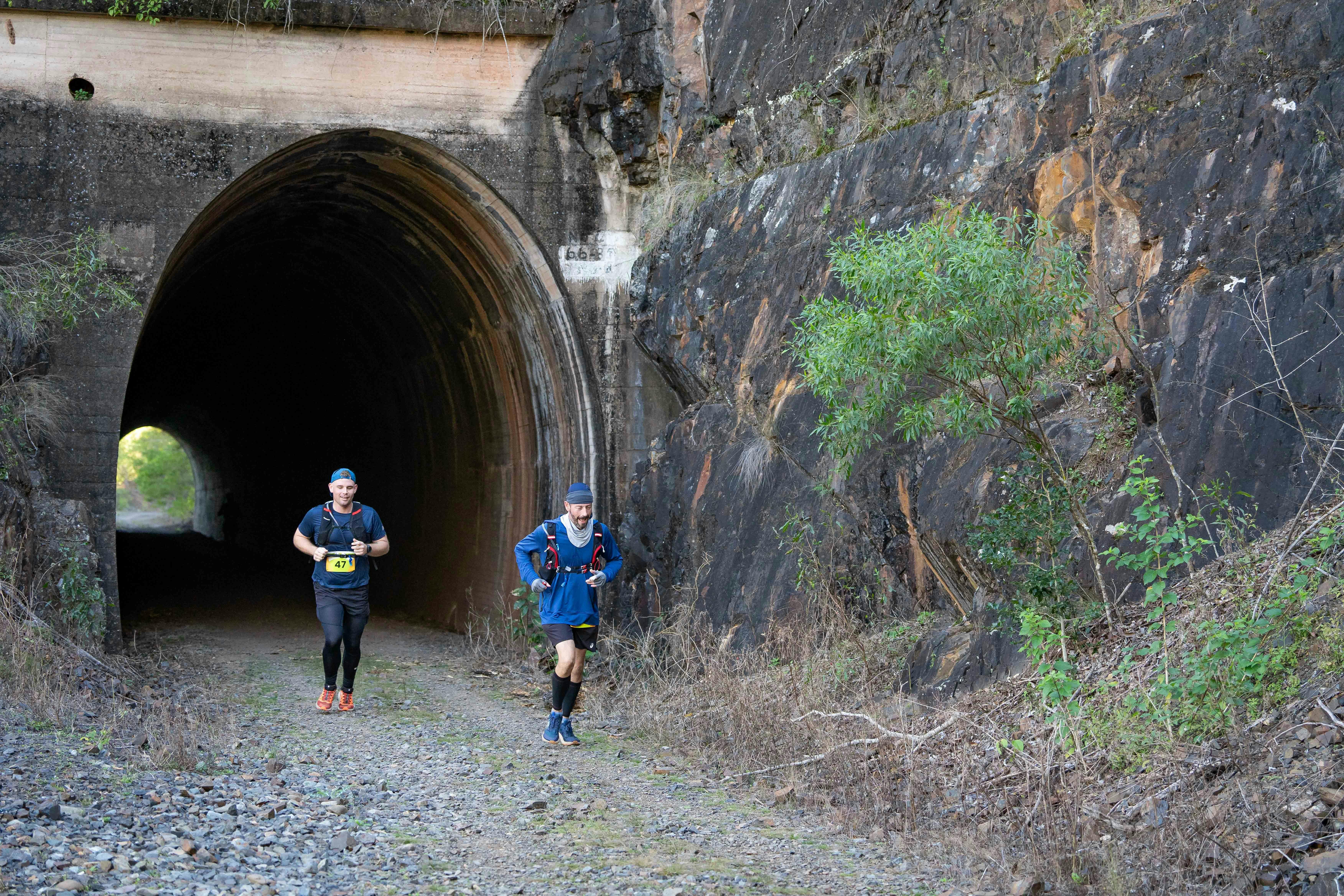 Runners through tunnels