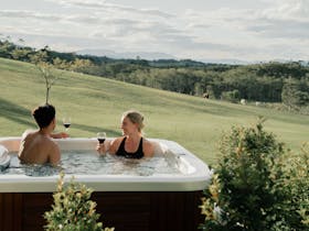 hot tub with hinterland view