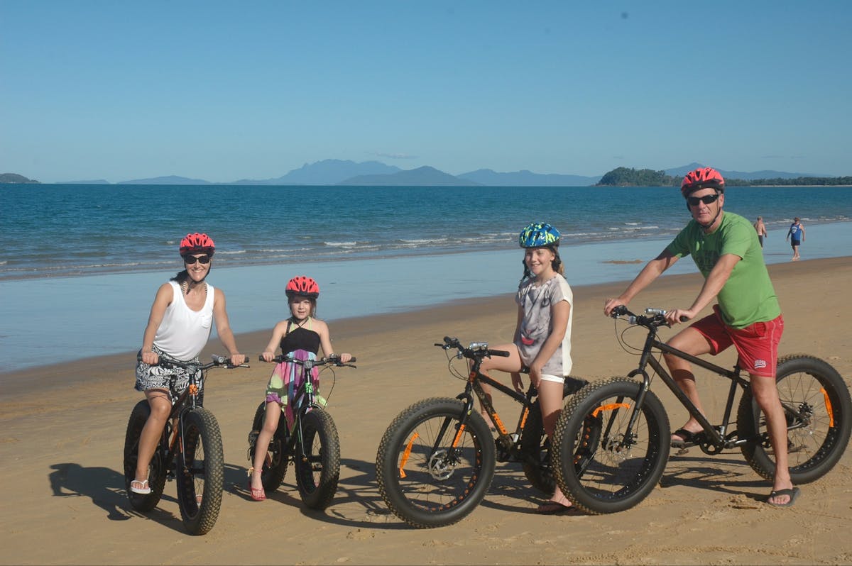 Hire the beach bikes for a spin along the sand