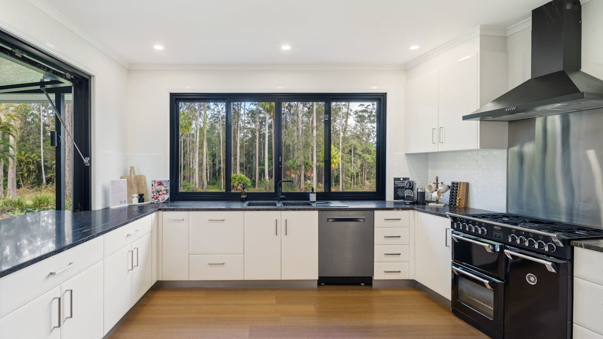 The kitchen is complete with quality appliances.