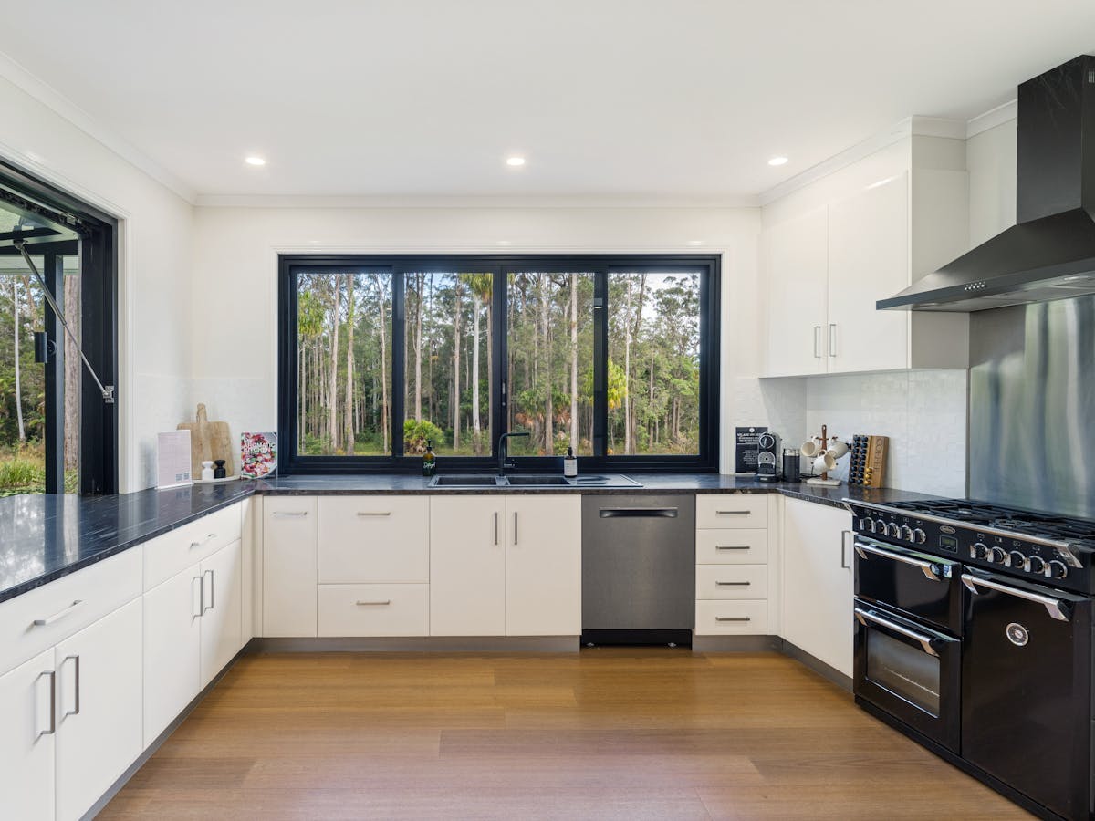 The kitchen is complete with quality appliances.