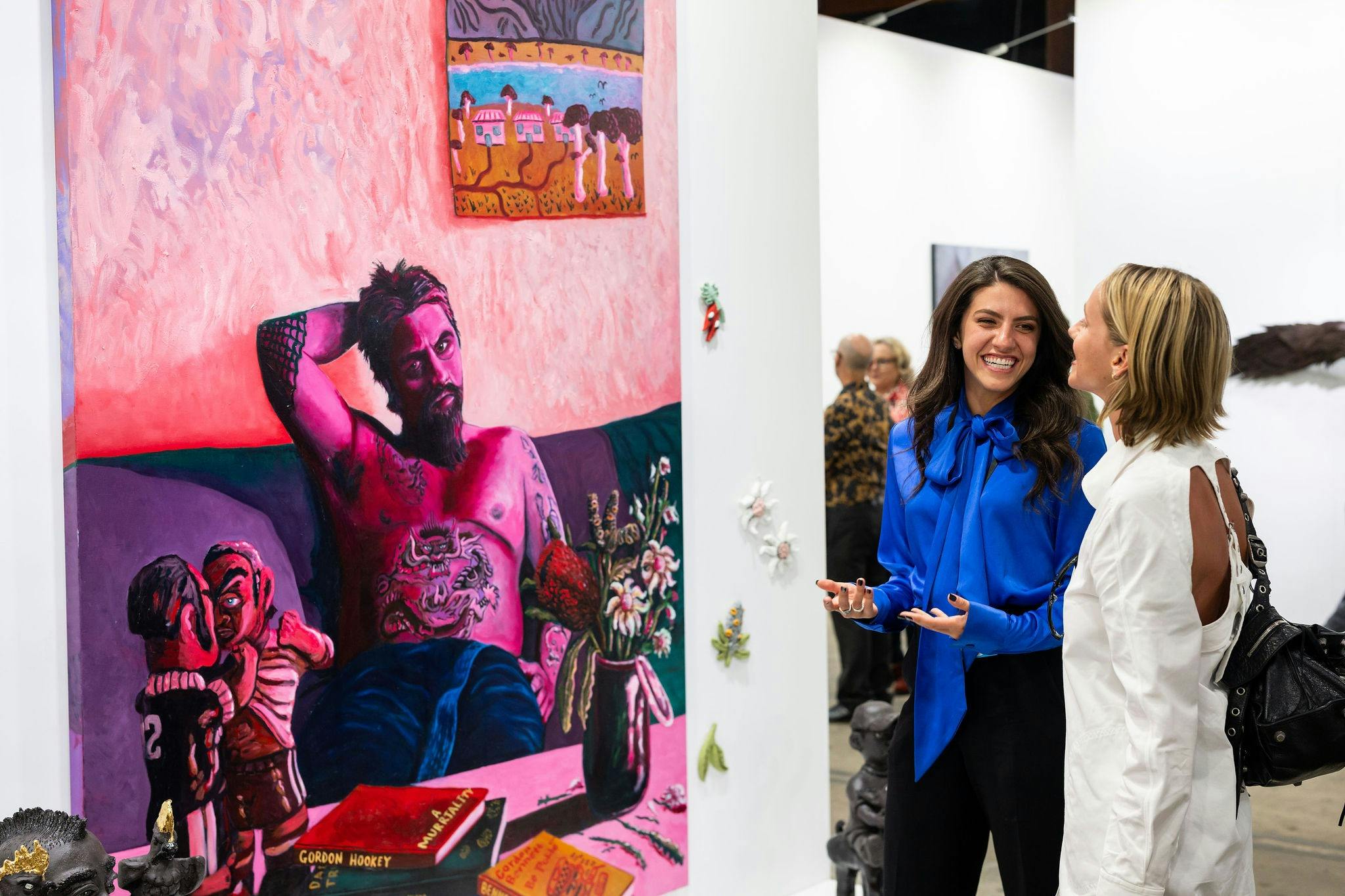 Women looking at art